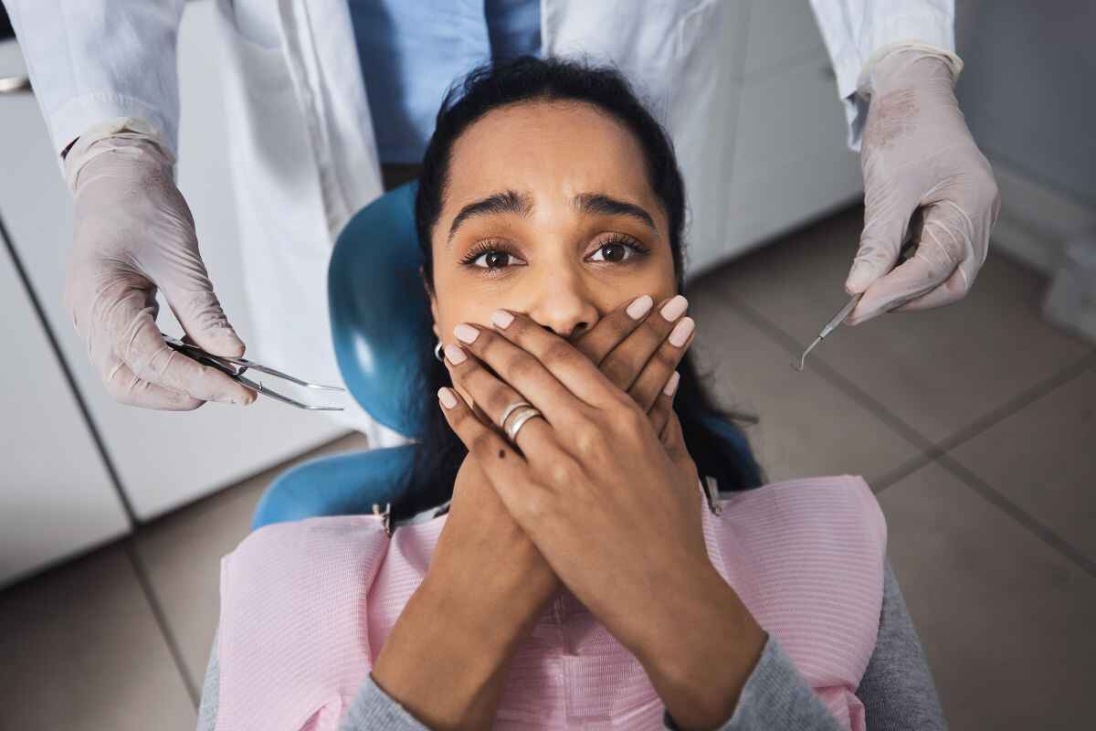 patient with dental anxiety at the dentist